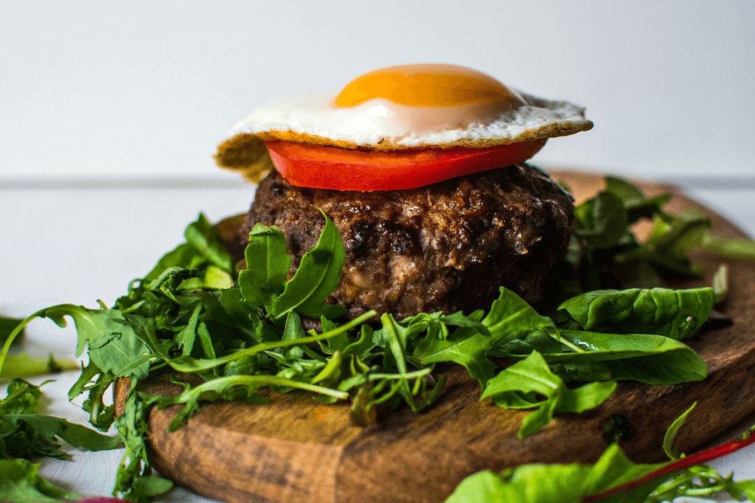 https://paleorecipesecrets.com/wp-content/uploads/2019/10/Breakfast-Beef-Burger-with-Fried-Egg_web.png